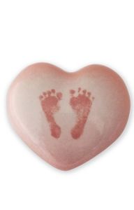 Urne bébé en céramique coeur dans empreinte du pieds